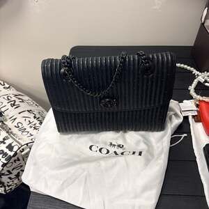 Coach Parker Shoulder Bag with Vertical Quilting and Rivets in Black Leather